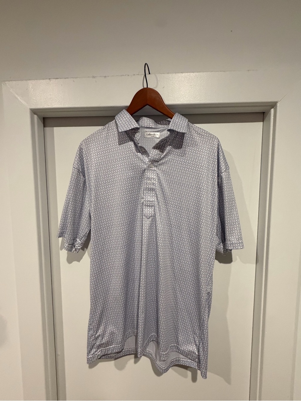Men's Light Blue Micro-Pattern Polo Shirt by Collars & Co.